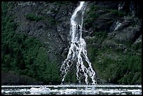 Waterfall dropping into the sea. Prince William Sound, Alaska, USA ( color)