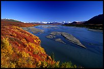 Wide river and autumn colors on the tundra. Alaska, USA