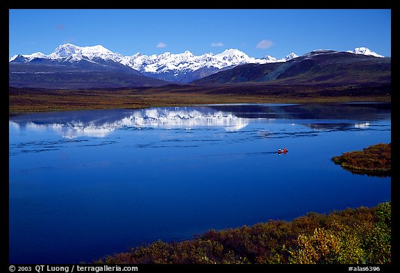 Lake with snowy peaks reflected. Alaska, USA (color)