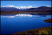 Lake with snowy peaks reflected. Alaska, USA (color)