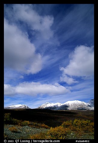 Mountain landscape with large white clouds. Alaska, USA