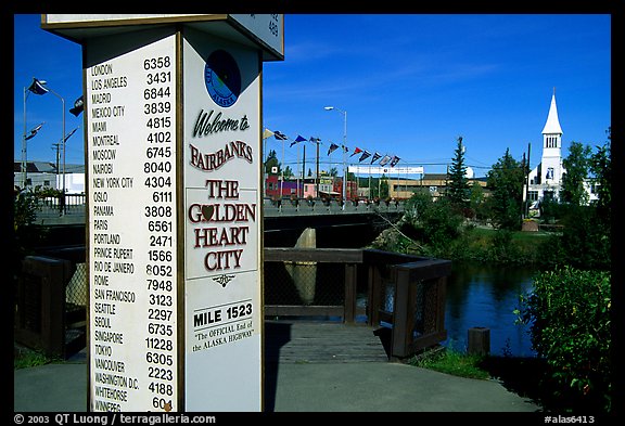 Sign showing distances to major cities on the globe in Fairbanks. Fairbanks, Alaska, USA (color)