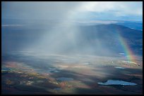 Aerial view of lakes, rainshowers, and rainbow. Alaska, USA ( color)