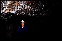 Caver inside a lava tube, Lava Beds National Monument. Lava Beds National Monument, California, USA ( color)