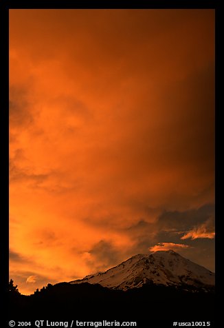 Clouds dramatically colored at sunset above Mt Shasta. California, USA