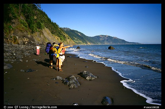 Backpackers on the beach,  Lost Coast. California, USA (color)