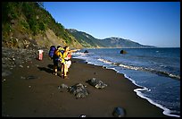 Backpackers on the beach,  Lost Coast. California, USA (color)