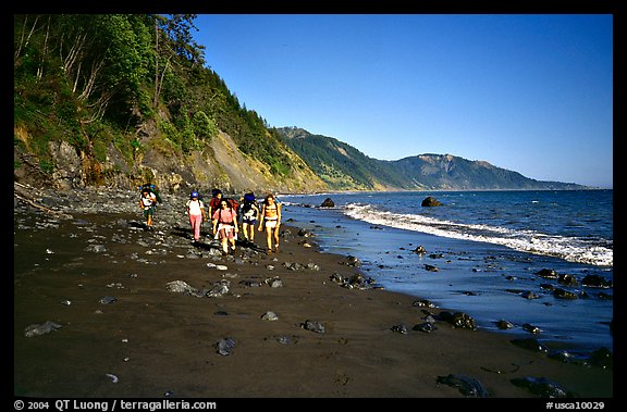 Backpackers on the beach,  Lost Coast. California, USA (color)