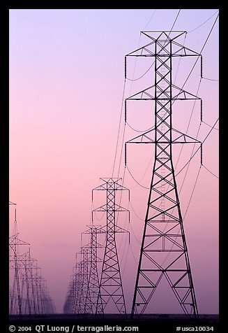 High tension power lines at dusk. California, USA