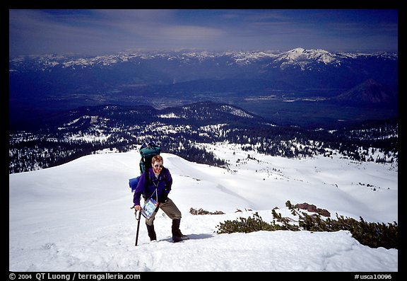 Climber takes a break on the Green Ridge of Mt Shasta. California, USA