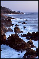 Coastline with pointed rocks and surf, sunset, Garapata State Park. Big Sur, California, USA