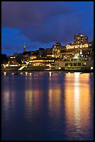 Lights of Ghirardelli Square sign reflected in Aquatic Park. San Francisco, California, USA (color)