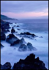 Rocks and surf near Rocky Cny Bridge, Garapata State Park, dusk. Big Sur, California, USA