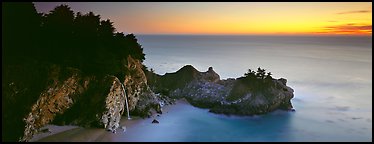 Seascape at sunset with coastal waterfall. Big Sur, California, USA