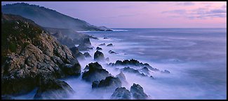 Seascape with pastel colors, rocks, and surf. Big Sur, California, USA (Panoramic color)