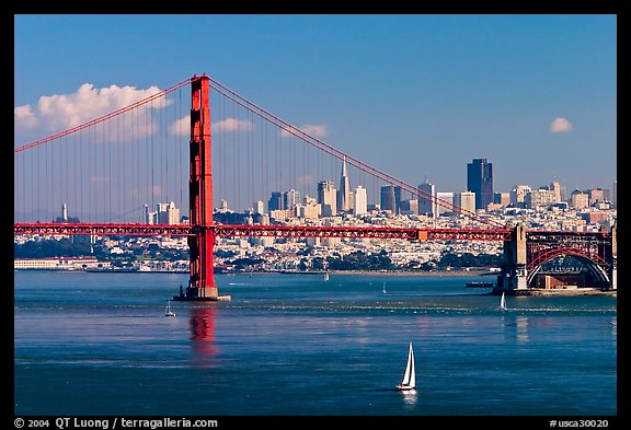 Sailboat, Golden Gate Bridge with city skyline, afternoon. San Francisco, California, USA (color)