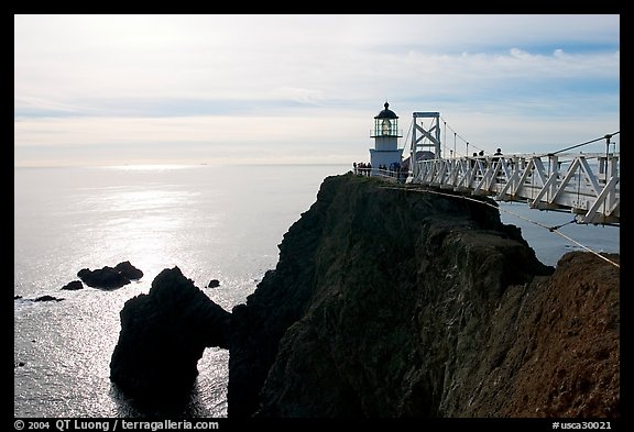 Narrow bridge leading to the Point Bonita Lighthouse, afternoon. California, USA