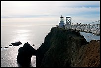 Narrow bridge leading to the Point Bonita Lighthouse, afternoon. California, USA (color)