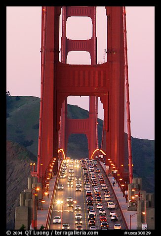 Traffic on Golden Gate Bridge at sunset. San Francisco, California, USA (color)