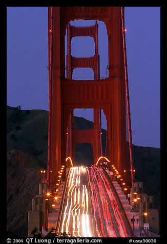 Traffic on Golden Gate Bridge at dusk. San Francisco, California, USA (color)