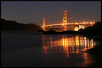 Golden Gate bridge at night from Baker Beach. San Francisco, California, USA (color)