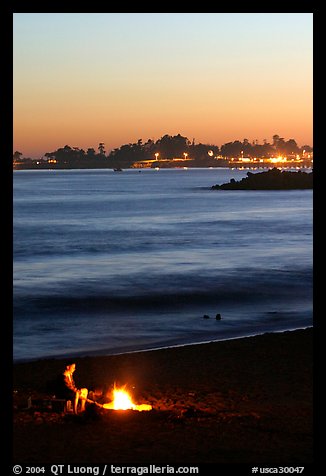 Bonfire on the beach at sunset. Santa Cruz, California, USA (color)