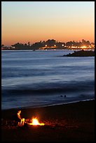 Bonfire on the beach at sunset. Santa Cruz, California, USA (color)