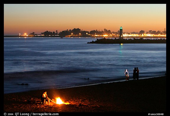 Beach campfire at sunset. Santa Cruz, California, USA (color)