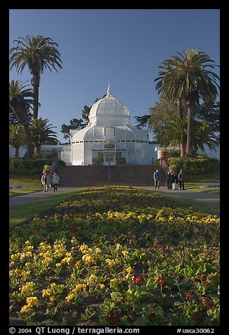 Flower bed and Conservatory of the Flowers, late afternoon, Golden Gate Park. San Francisco, California, USA (color)