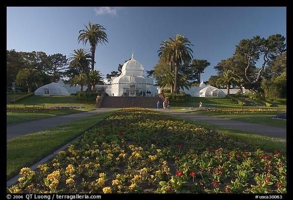 Flower bed and Conservatory of the Flowers, late afternoon, Golden Gate Park. San Francisco, California, USA