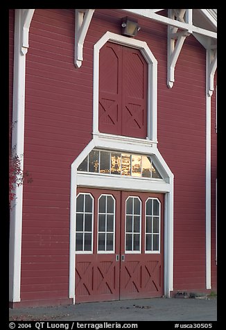 Door with sunset reflections, Red Barn. Stanford University, California, USA (color)