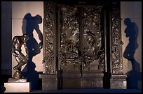 Rodin's monumental Gates of Hell at night. Stanford University, California, USA