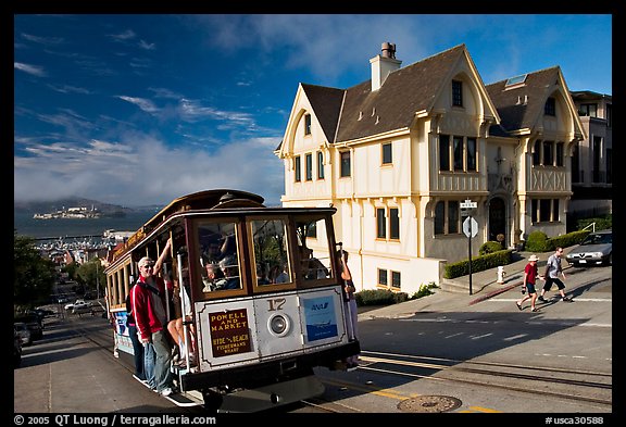 Cable car climbing, and Tudor house, late afternoon. San Francisco, California, USA (color)