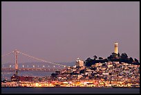 Telegraph Hill and Bay Bridge at dusk. San Francisco, California, USA