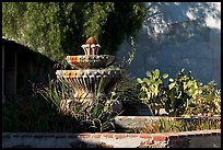 Fountain and cacti, Mission San Miguel Arcangel. California, USA