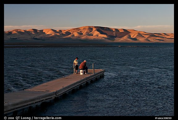 Fishing on San Luis Reservoir at sunset. California, USA