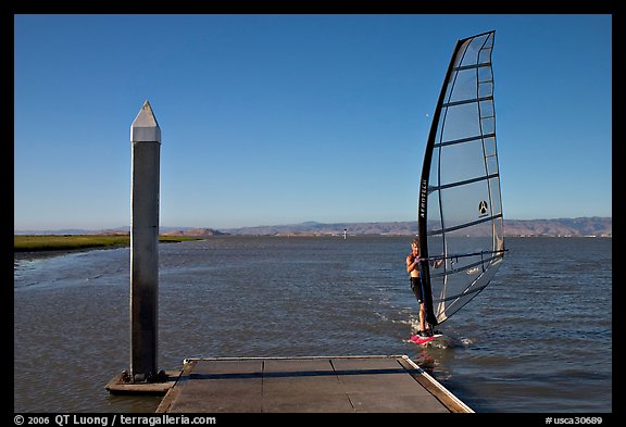 Windsurfer near deck, Palo Alto Baylands. Palo Alto,  California, USA (color)