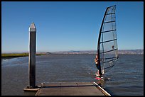 Windsurfer near deck, Palo Alto Baylands. Palo Alto,  California, USA (color)