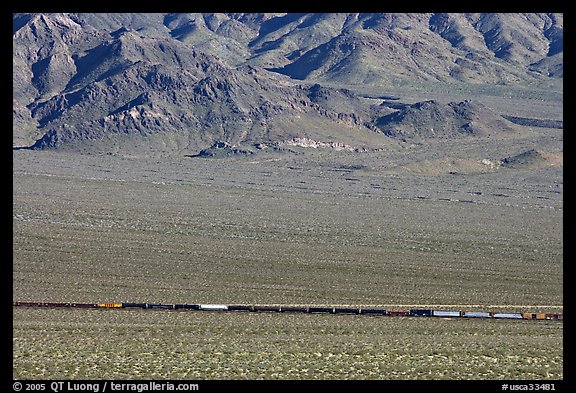 Freight train in desert valley. Mojave National Preserve, California, USA