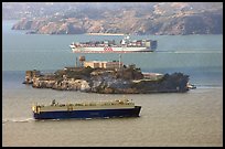 Cargo ships and Alcatraz Island in the San Francisco Bay. San Francisco, California, USA