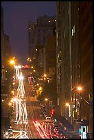 Steep California street and lights at night. San Francisco, California, USA (color)