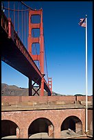 Fort Point courtyard, flag pole, and Golden Gate Bridge. San Francisco, California, USA (color)