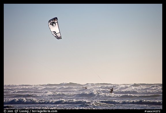 Kitesurfer in powerful waves, afternoon. San Francisco, California, USA
