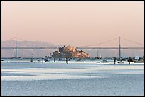 Alcatraz Island and Bay Bridge, sunset. San Francisco, California, USA