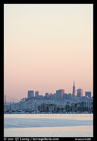 Sausalito houseboats and San Francisco skyline, sunset. San Francisco, California, USA (color)