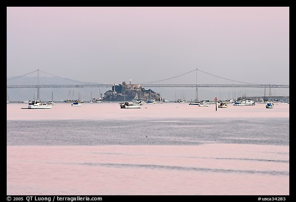 Harbor in Richardson Bay and city skyline painted in pink hues at sunset. San Francisco, California, USA