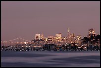 Sausalito houseboats and San Francisco skyline at night. San Francisco, California, USA (color)