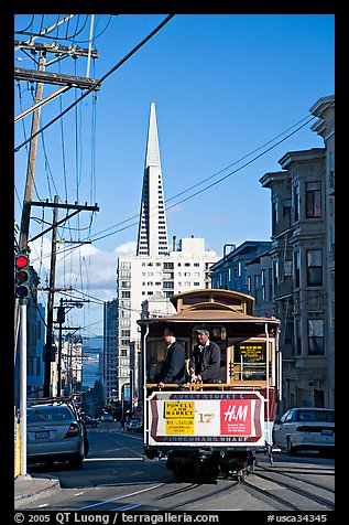 Cable car and Transamerica Pyramid. San Francisco, California, USA
