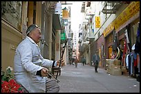 Ehru musician in Ross Alley, Chinatown. San Francisco, California, USA (color)