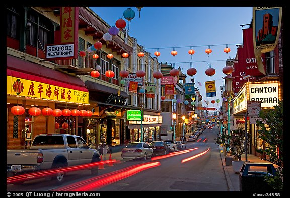 Lanterns and lights on Grant Street at dusk, Chinatown. San Francisco, California, USA